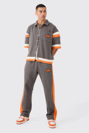 BOXY FIT VARSITY CAMISA AGASALHO