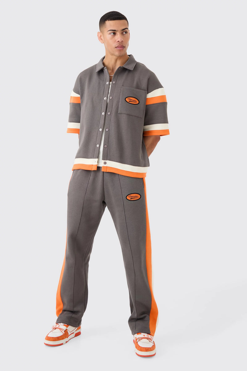 BOXY FIT VARSITY CAMISA AGASALHO