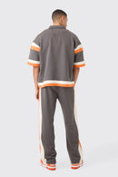 BOXY FIT VARSITY CAMISA AGASALHO