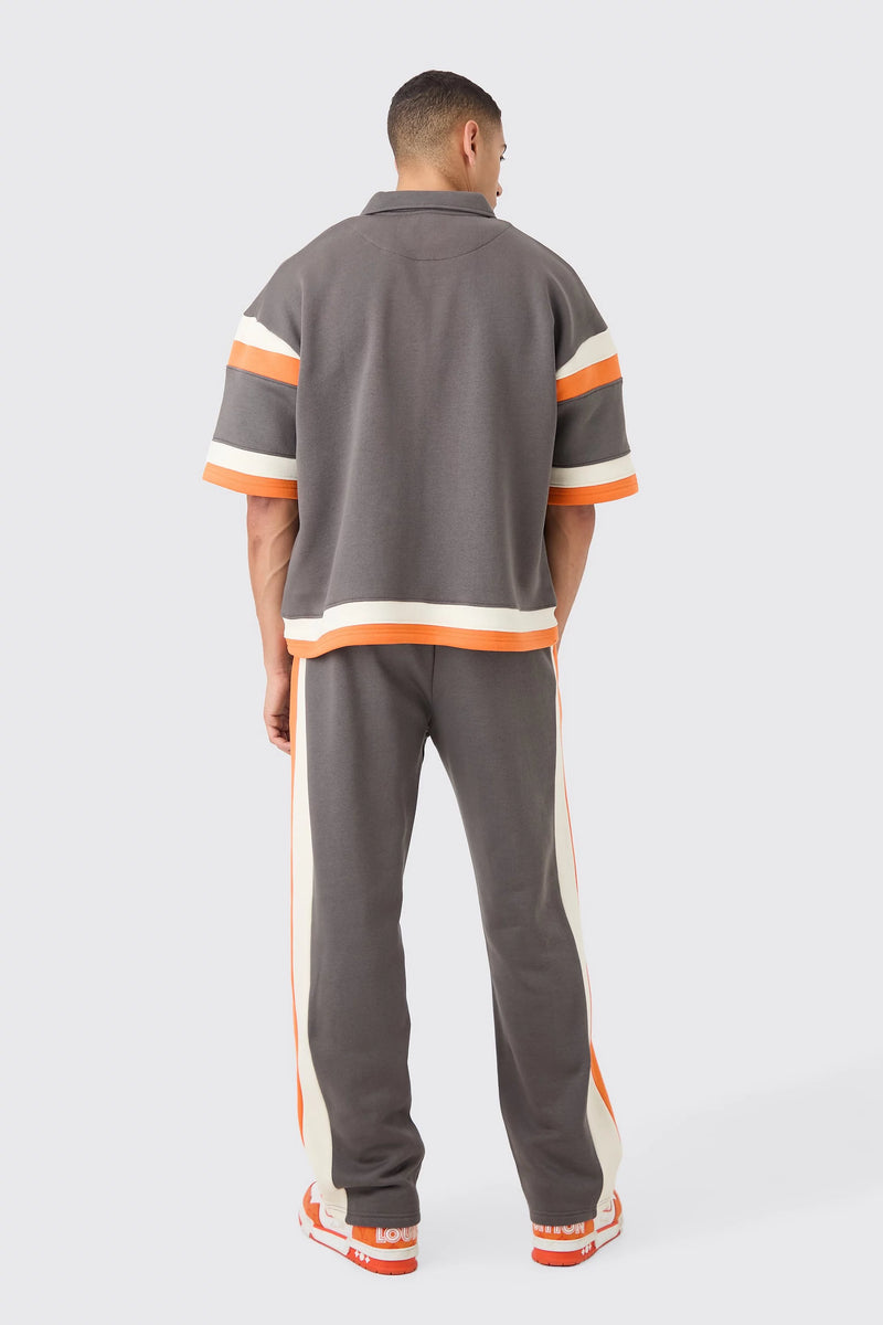 BOXY FIT VARSITY CAMISA AGASALHO