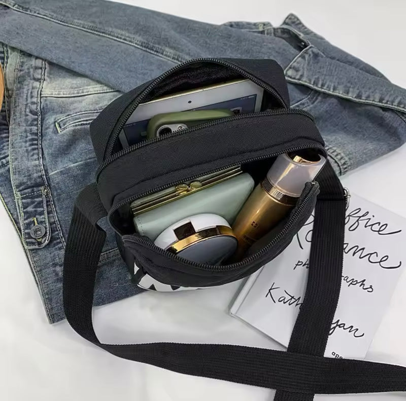 Bolsa de ombro tiracolo